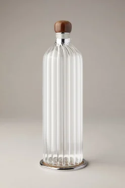 Water bottle with coaster and cap in zebu